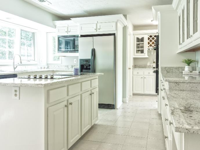 Inside empty kitchen cabinets